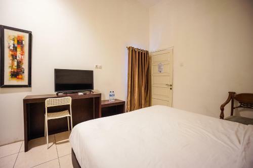 Capital O 3433 Hotel Plaza