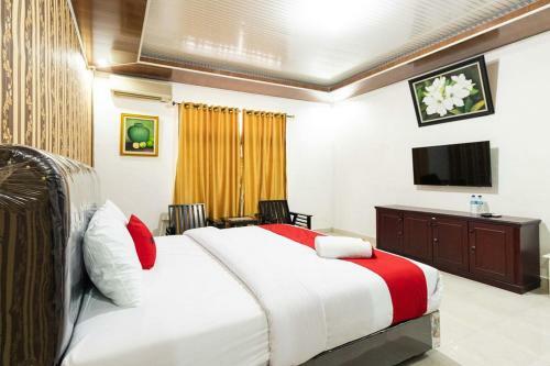 Hostal Reddoorz Plus Near Universitas Methodist Medan