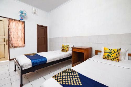 Hotel Spot On 2865 Sartika Inn Pati