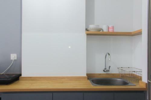 Artistic Studio At Emerald Bintaro Apartment By Travelio