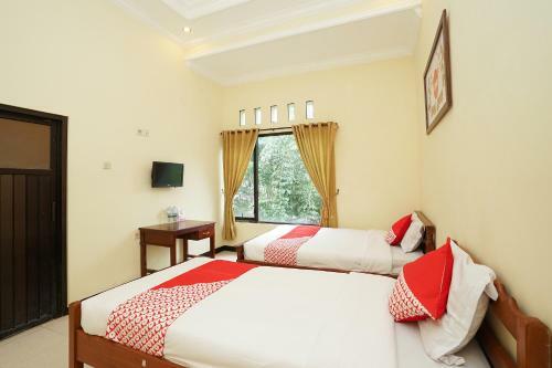 Hotel Oyo 587 Penginapan Sinar Harapan