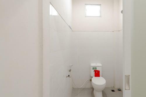Hostal Reddoorz Plus Syariah @ Raya Nginden 2