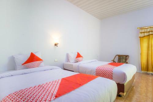 Hotel Oyo 2186 Tongging Beach