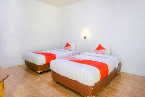 Hotel Oyo 2186 Tongging Beach