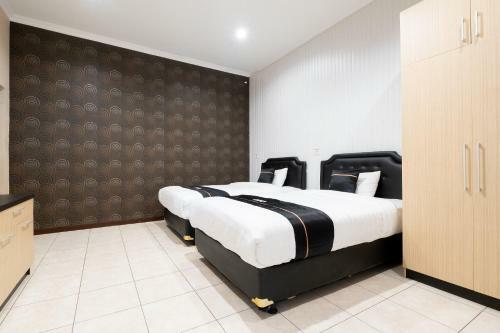 Hotel Oyo 2469 Sutomo Homestay