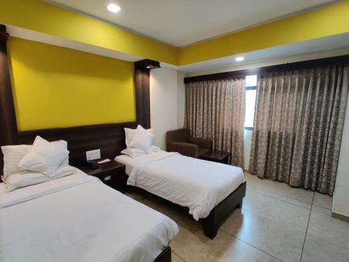 Hotel Pride Biznotel - The Maison Anand