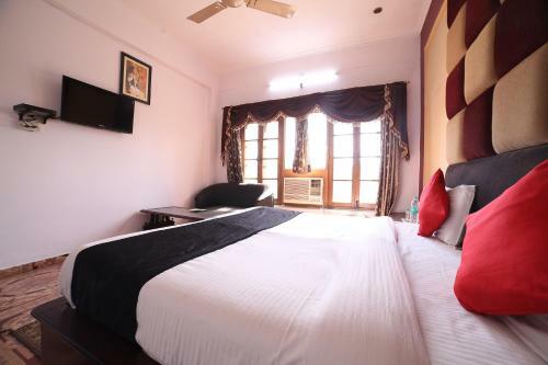 Capital O 38730 Hotel Mansarovar Deluxe