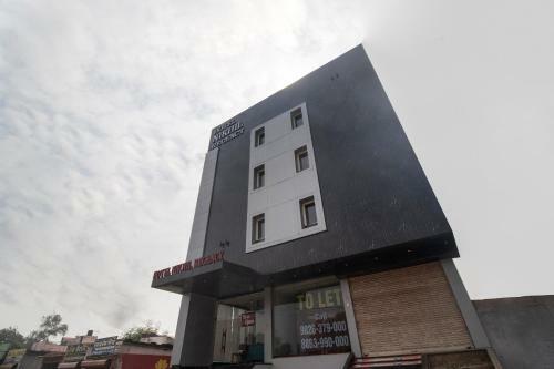 Hotel Capital O 28650 Nikhil Regency