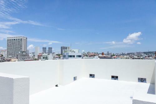 Apartamento Kokusai Street Garden Hotel