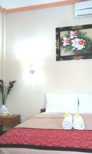 Hotel Taxa Inn Kuta Raya