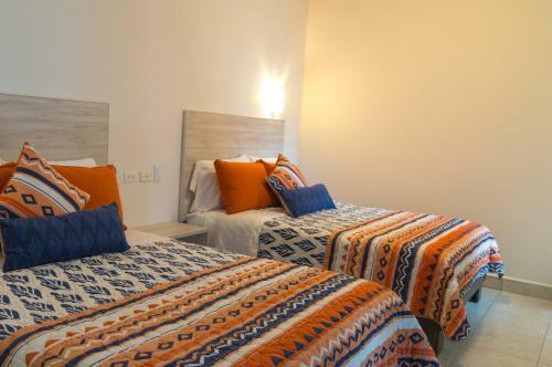Albergue Magnolias Suites Hotel