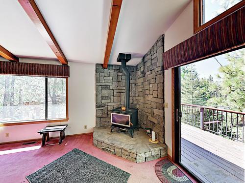New Listing! Fireside Fun With Deck, Game Room & Bar Home