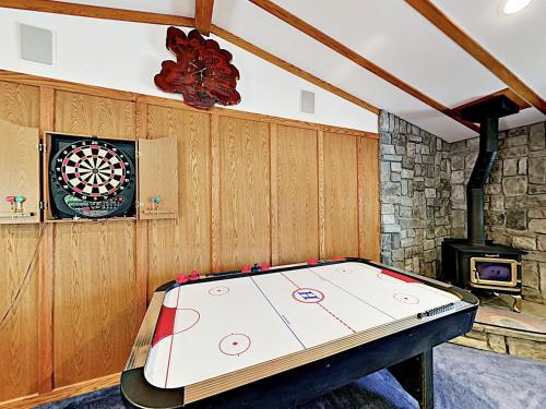 New Listing! Fireside Fun With Deck, Game Room & Bar Home