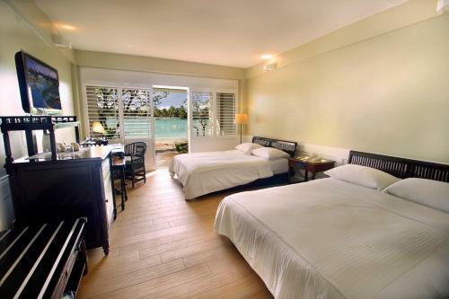 Hotel Plantation Bay Resort And Spa