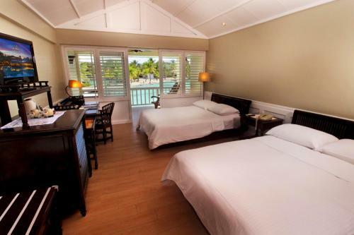 Hotel Plantation Bay Resort And Spa