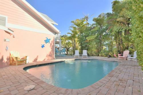 Tropical Island Waterfront Dream Home With Private Pool