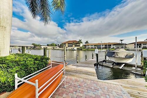 Canal-side ?sky Palms Villa? - Dock, Pool & Hot Tub Home