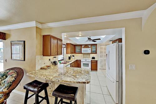 Canal-front Escape - Heated Pool, Spa, Gulf Access Home