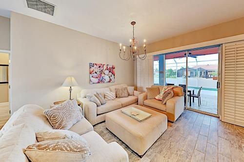 Lavish Canal-front Getaway With Heated Pool & Dock Home