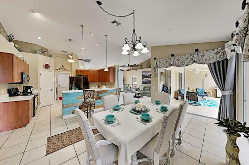 Canalfront Beauty With Private Heated Pool & Garage Home