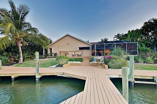 Canal-front Retreat With Boat Dock & Screened Pool Home
