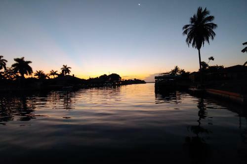 Canal-front Getaway With Heated Pool & Dock Home