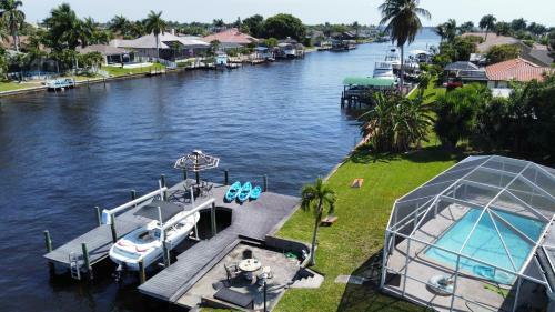 Canal-front Getaway With Heated Pool & Dock Home