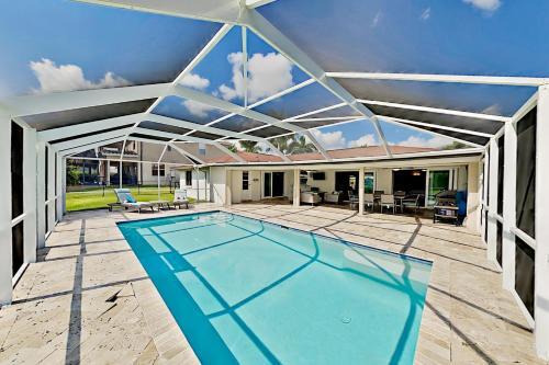 Chic Canal-front Home - Heated Pool, Private Dock Home