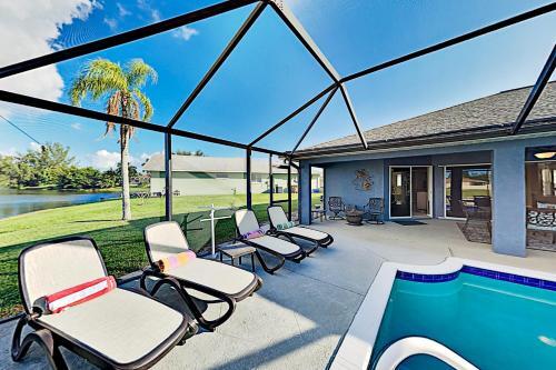 Waterfront Oasis - Private Caged Pool, Spa & Dock Home