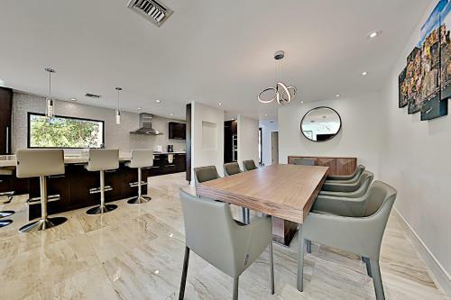 Exclusive Zen Oasis - Smart Pool & Private Beach Home