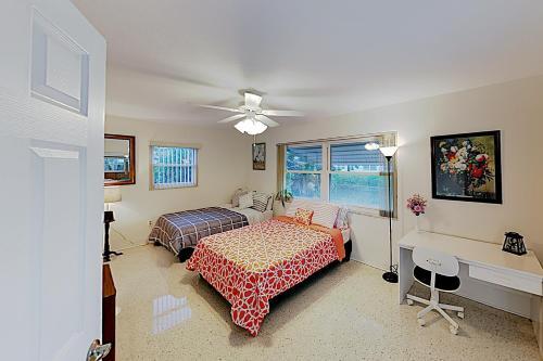New Listing! Canal-front Escape With Private Yard Home