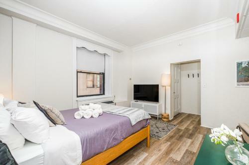 Evonify Stays - Theatre District Apartments