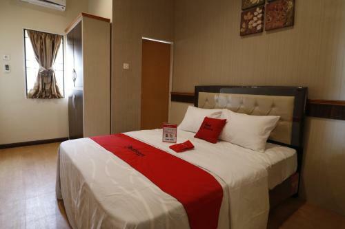 Hostal Reddoorz Plus Near Universitas Sumatera Utara