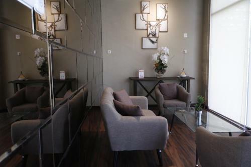 Hostal Reddoorz Plus Near Universitas Sumatera Utara