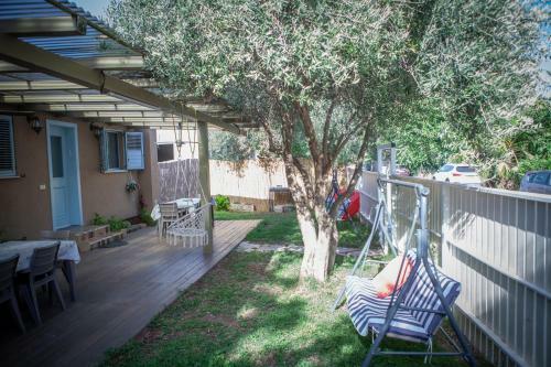 Lodge Olive - Israeli Zimmer