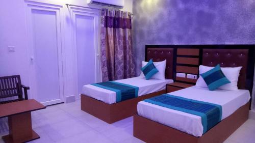 Hotel Capital O 13310 Noida Suites