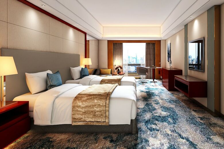 Manhattan Kinlen Hotel - Shishi