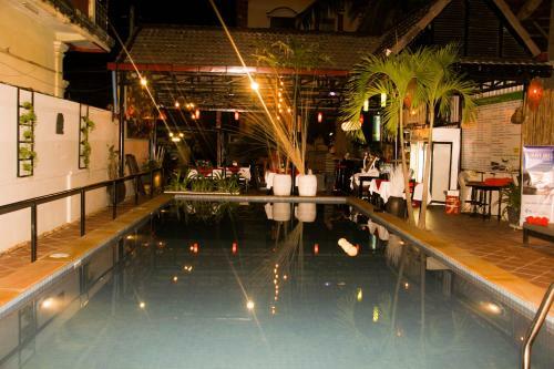 Hostal Tropical Breeze Guesthouse