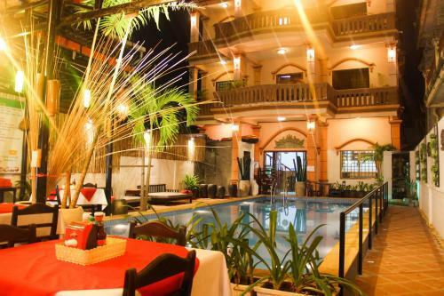 Hostal Tropical Breeze Guesthouse