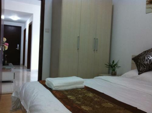 Shengang Apartment Dongmen Branch