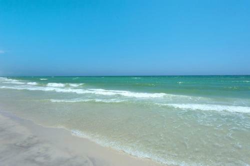 Brightly Furnished Beachfront Condominium