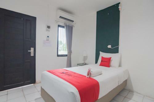 Hotel Reddoorz At Sani Guest House