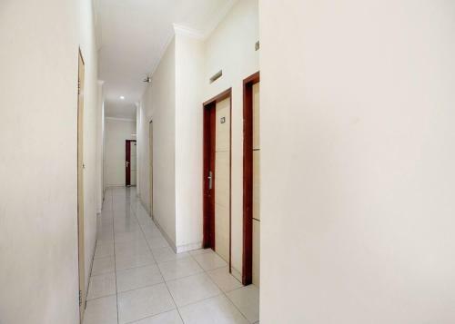 Oyo 2554 Hotel Arimbi Lama Dewi Sartika
