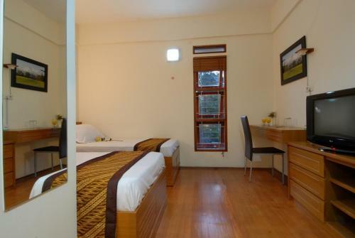 Bed & Breakfast Rumah Tawa Hotel Syariah