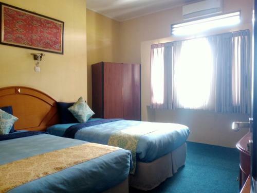 Oyo 90102 Edotel Hotel By Dbest Hospitality