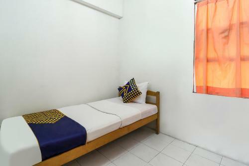 Hotel Spot On 90894 Icarus Home Syariah