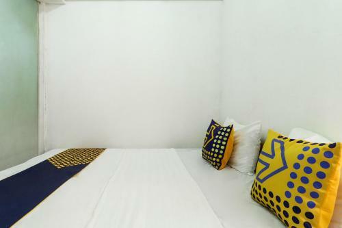 Hotel Spot On 90894 Icarus Home Syariah