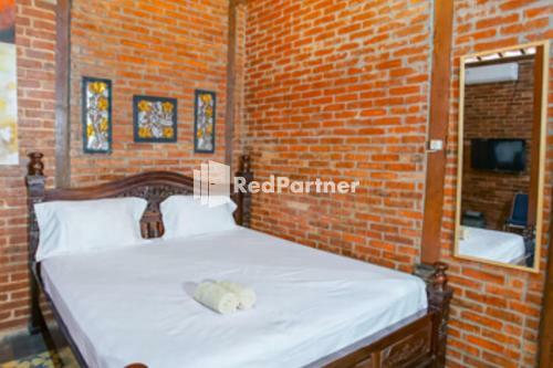 Hotel Omahe Haji Qoema Syariah 3 Redpartner