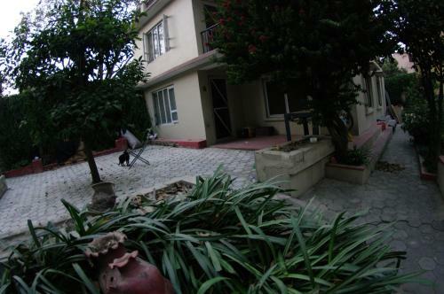 Hostal Laughing Buddha Hotel & Garden Theater