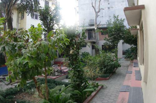 Hostal Laughing Buddha Hotel & Garden Theater